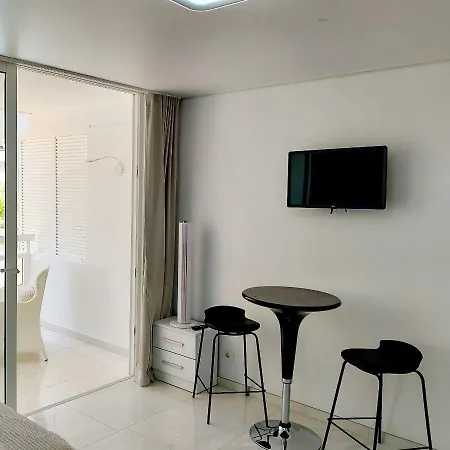 Under The Palm Playa de las Americas (Tenerife)